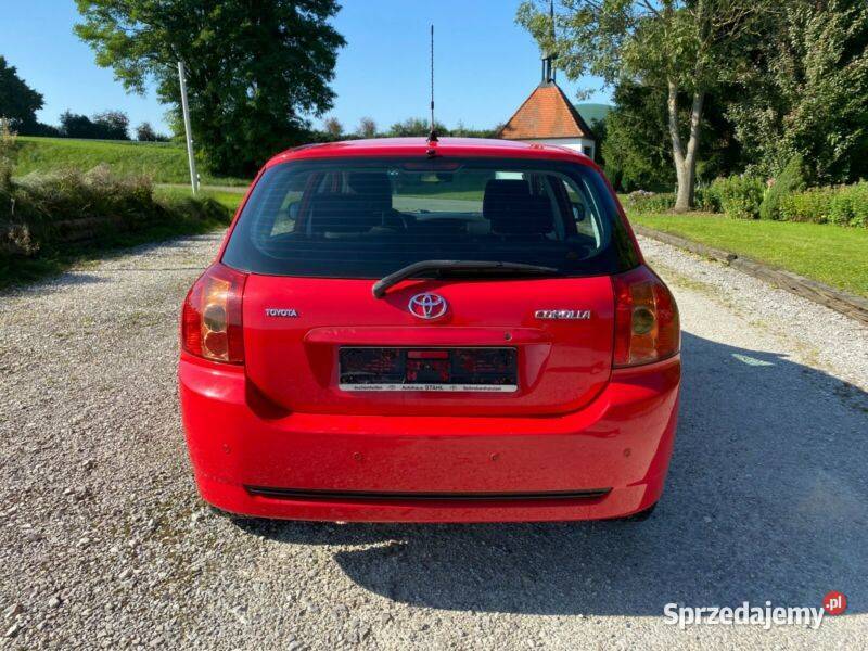 COROLLA E12 drzwi lewy przód czerwoną bez