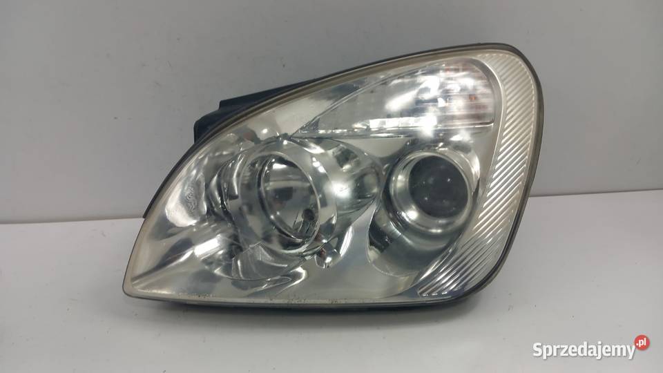 KIA CARENS III LAMPA PRZÓD LEWA SOCZEWKA osobowe Lampy przednie Zbierkowo