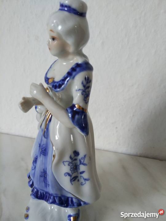 Figurka z porcelanydama z brawami Ropa