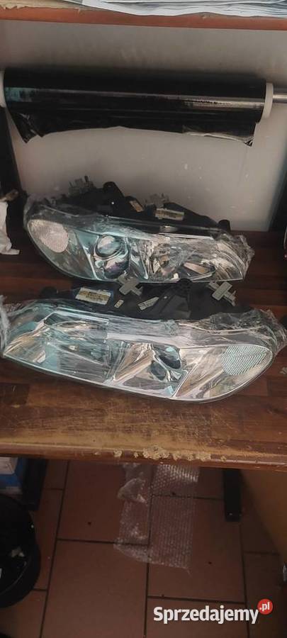 Komplet nowych reflektorów do Peugeot 406 coupe Lampy przednie Kalety