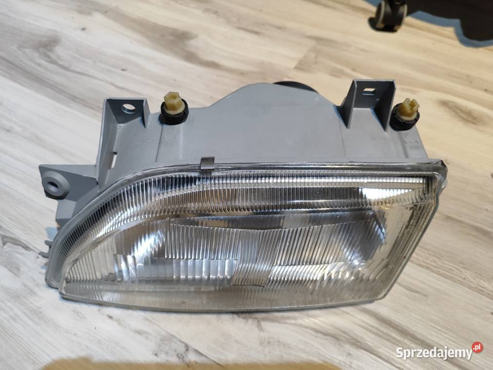 Reflektor przedni lewy Ford Escort MK5 Drążna
