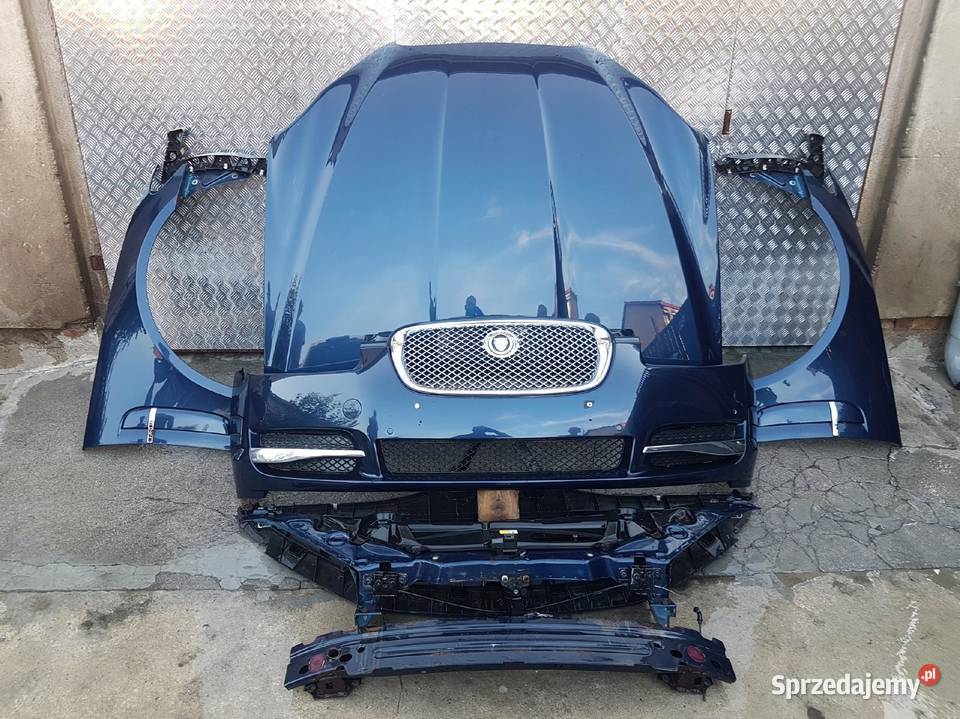 BŁOTNIK LEWY JAGUAR XF X250 0711