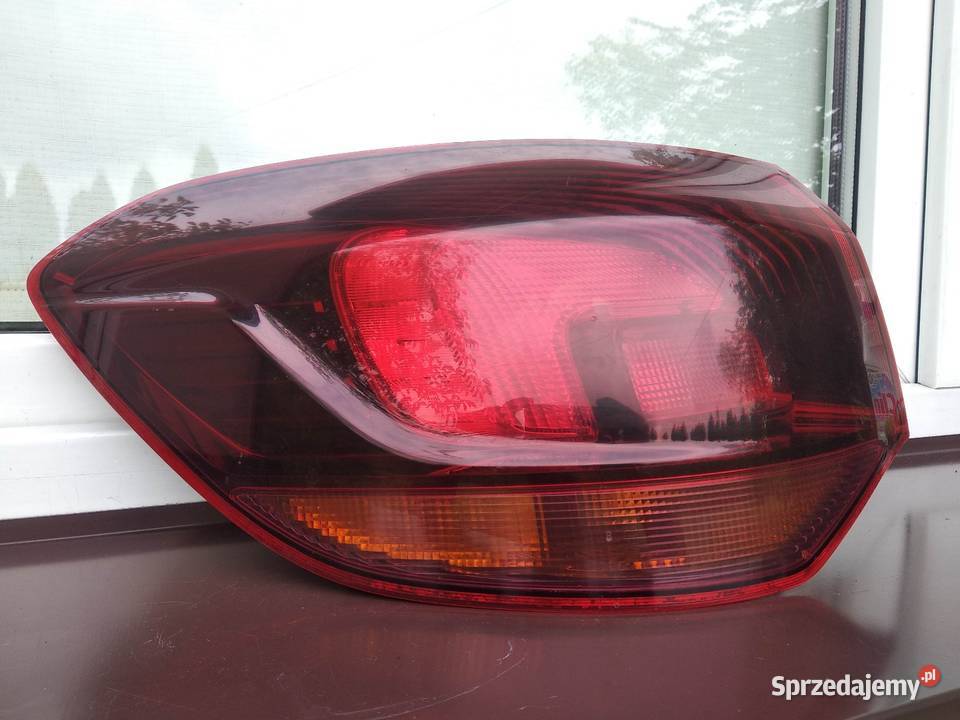 Opel Astra J kombi lampa tył tylna lewa narożna Sieradz