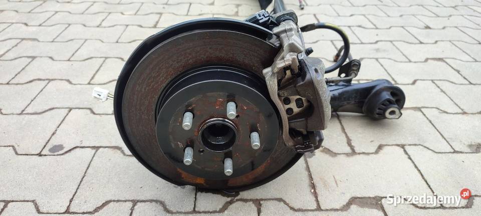 MAZDA 2 TOYOTA YARIS IV BELKA ZAWIESZENIE TYŁ 15 sprzedam