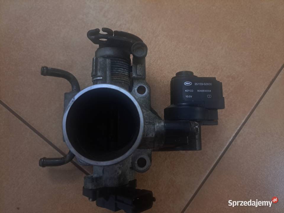 Przepustnica silnika Hyundai Kia 11 g4hg 1086 Rok produkcji 2005 Kolektory ssące Bukowa