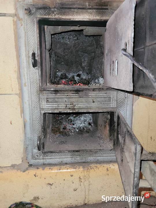 Zdun przestawienie pieca kaflowego Remont i Września
