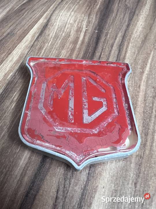 Znaczek na osłonę chłodnicygrill LOGO MG MGB Pozostałe Świebodzin