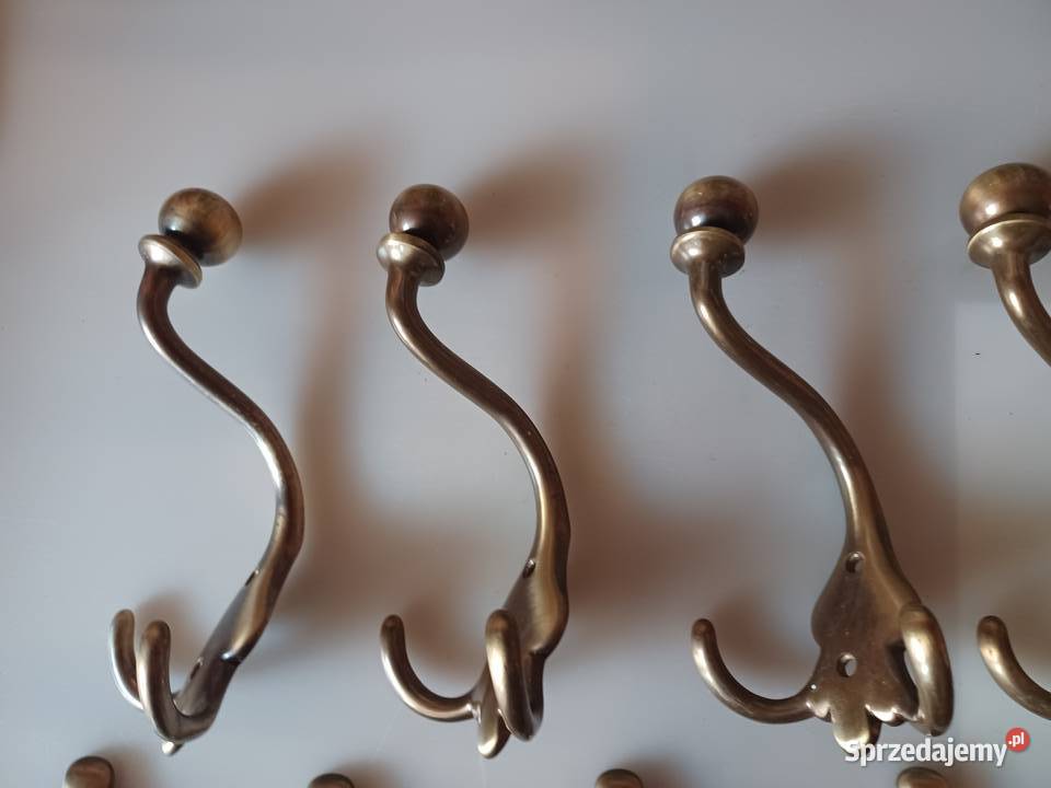 Ładny komplet masywnych wieszaków Mosiądz Poznań