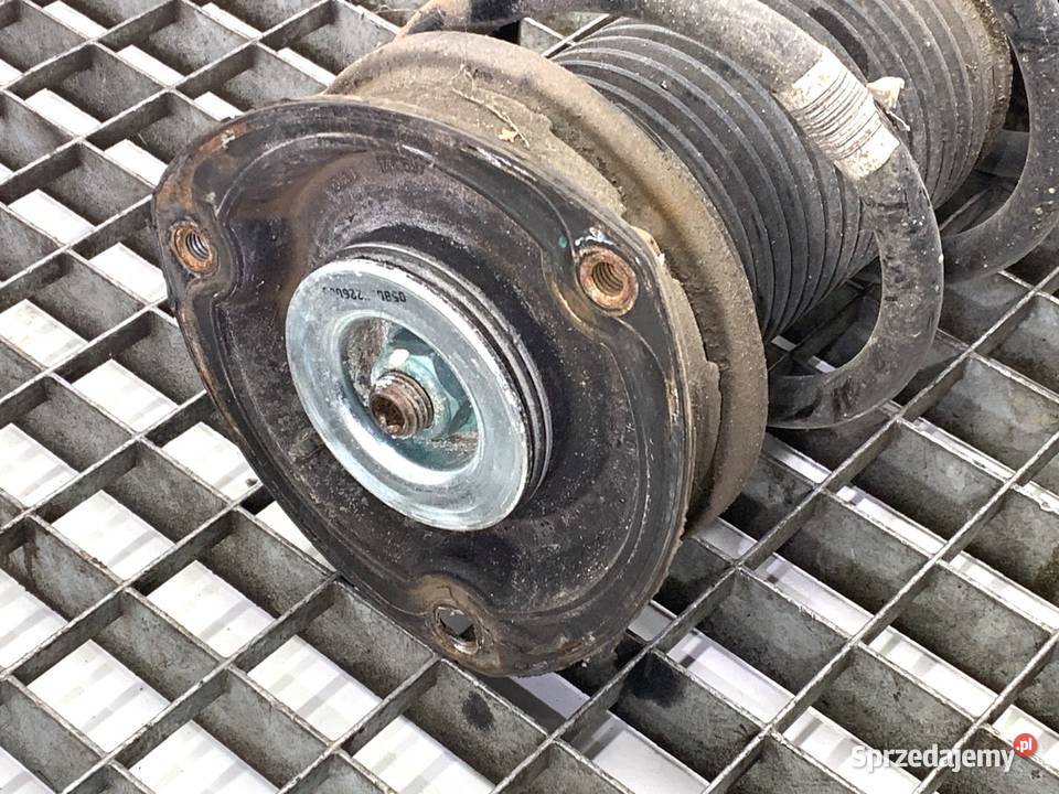 AMORTYZATOR LEWY PRZÓD ZE SPRĘŻYNĄ SKODA SUPERB