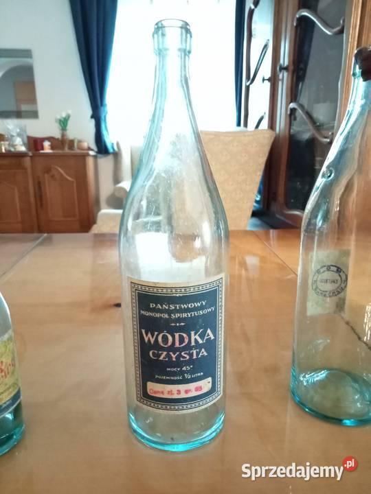 Butelki przedwojenne z okupacji z etykietami Łódź