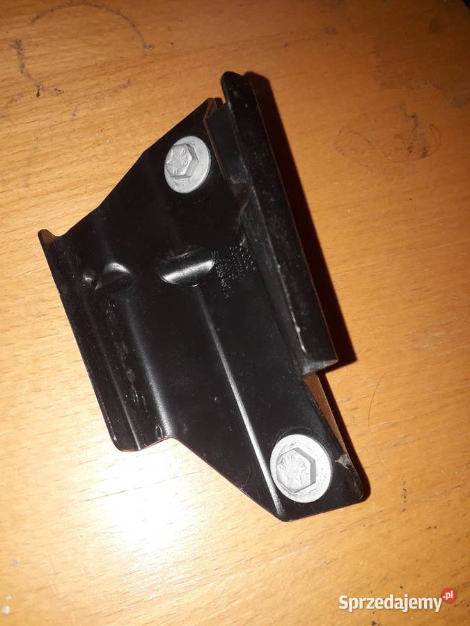 8A9955457 Wspornik uchwyt zbiornika płynu do