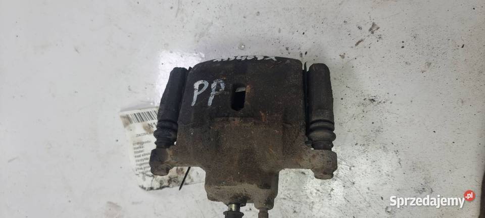 ZACISK HAMULCOWY PRZÓD PRAWY TOYOTA YARIS osobowe kujawsko-pomorskie Lipno
