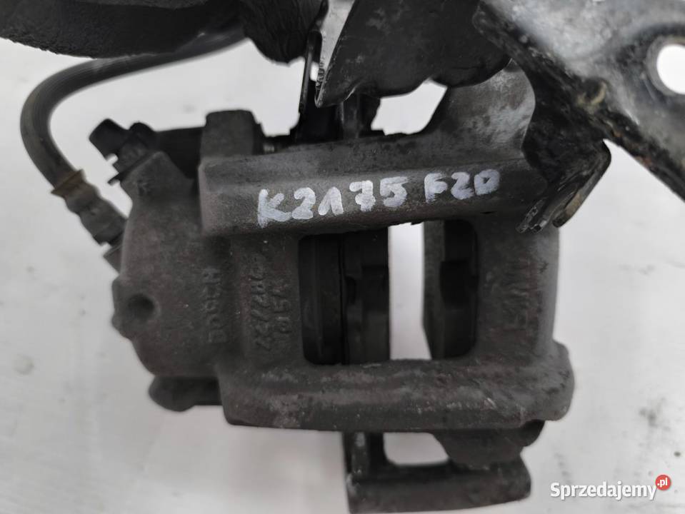 ZACISK LEWY PRZÓD BMW F20 F21 116i