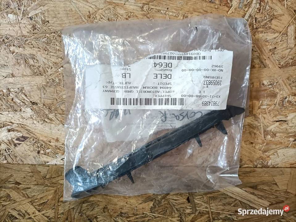 OPEL CORSA E ŚLIZG ZDERZAKA PRAWY PRZÓD 39014303 Pozostałe wielkopolskie Pleszew