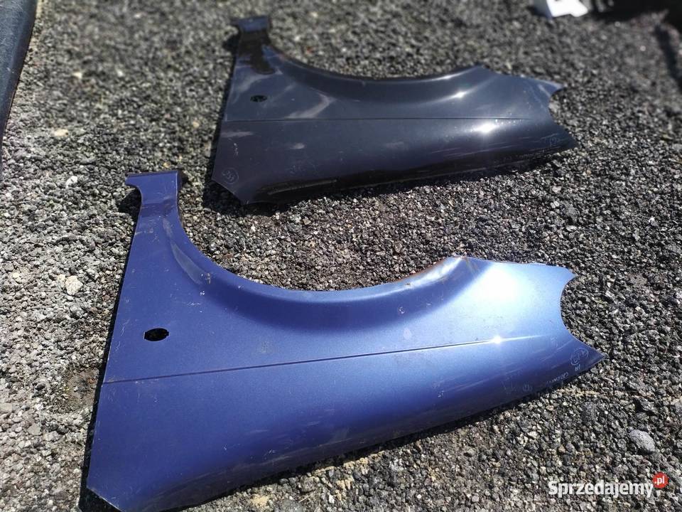 Kia carnival I 1999 2000 2001 błotnik przód lewy