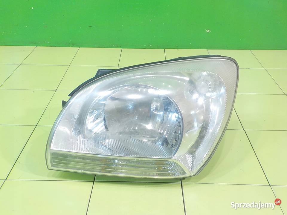 KIA SPORTAGE II 20 CRDI 05r 5D lampa lewa przod Suków