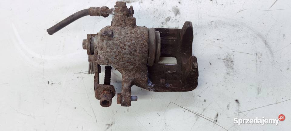 ZACISK HAMULCOWY LEWY TYŁ AUDI A4 B6 B7 288 MM Przystajń