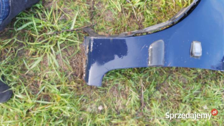 Blotnik przód lewy VOLVO V40 granatowy bez wielkopolskie Margonin