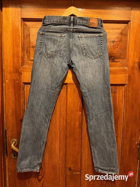 Jeansy męskie w28 L32 granatowe z przetarciami