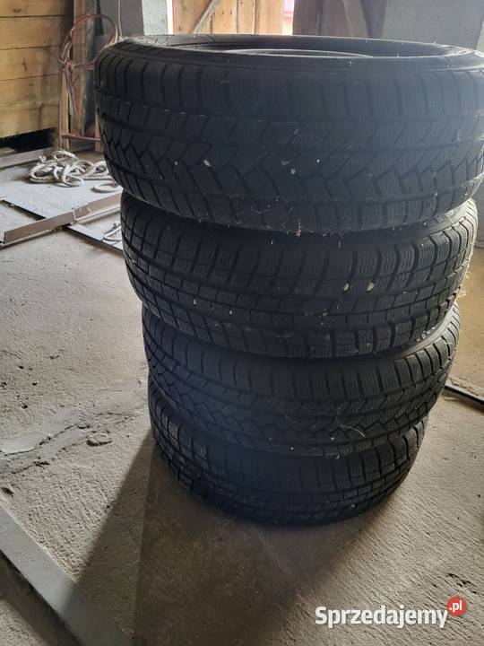 Opony zimowe komplet używane z felgami Samochodowe Mstów sprzedam