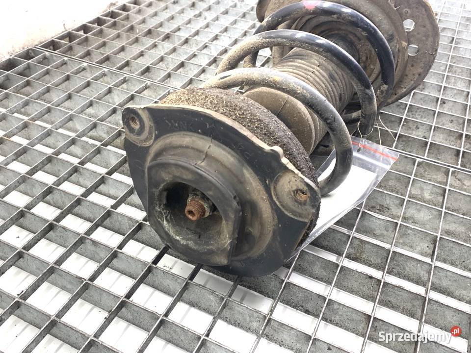 AMORTYZATOR PRAWY PRZÓD ZE SPRĘŻYNĄ NISSAN