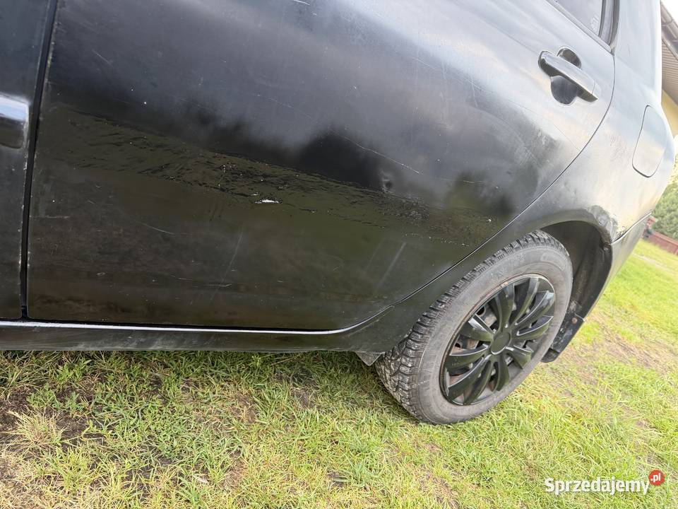 Toyota Corolla E12 2002 BenzynaGaz Rok produkcji 2002 Gwoździec