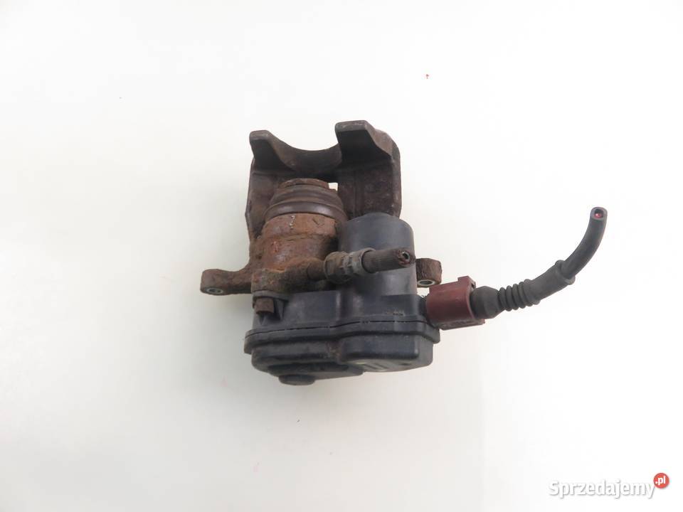 ZACISK LEWY TYŁ AUDI A4 B8 18 TFSI 32335478 sprzedam