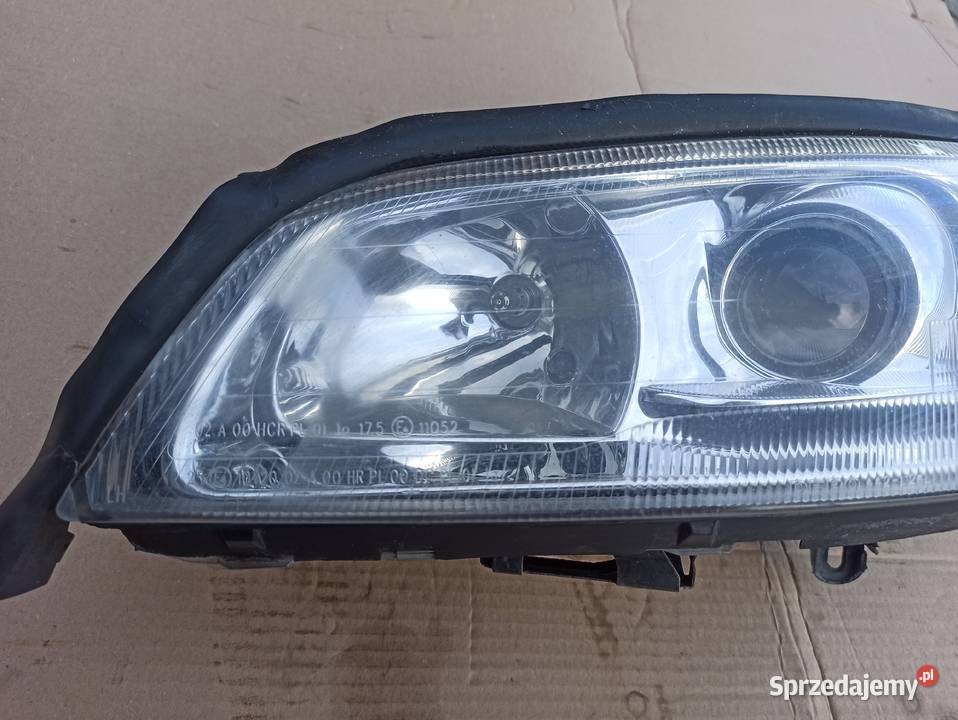 Lampa lewa przód OPEL OMEGA B XENON osobowe Bolesławiec