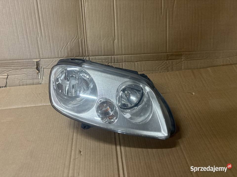 VW TOURAN CADDY III 2003 REFLEKTOR PRAWY 2KO Józefów