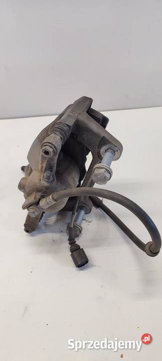 VW TIGUAN II ZACISK HAMULCOWY PRAWY PRZÓD Zaciski i jarzma