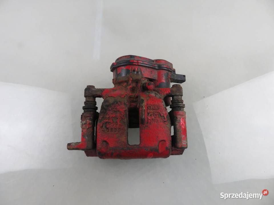 ZACISK LEWY TYŁ AUDI A4 B8 20 TDI 32335478