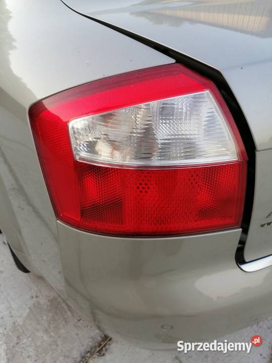 Błotnik tylny z progiem słupkiem tył Audi A4 B6 Szczerbice