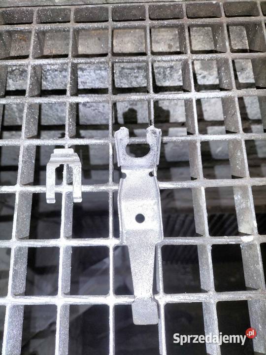 Uchwyt przewodu hamulcowego tylnego zwrotnicy