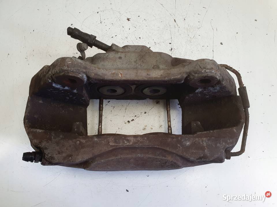 Audi A6 C7 PRZEDNI ZACISK HAMULCOWY lewy przód Rudka