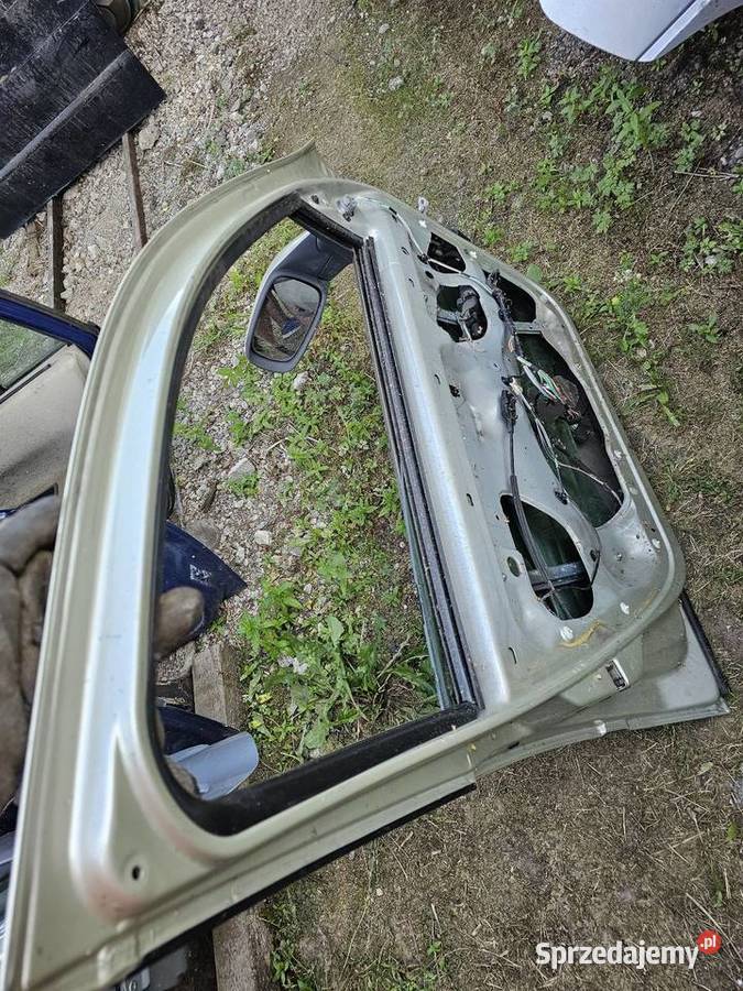 Drzwi laguna 1 lewy przód osobowe