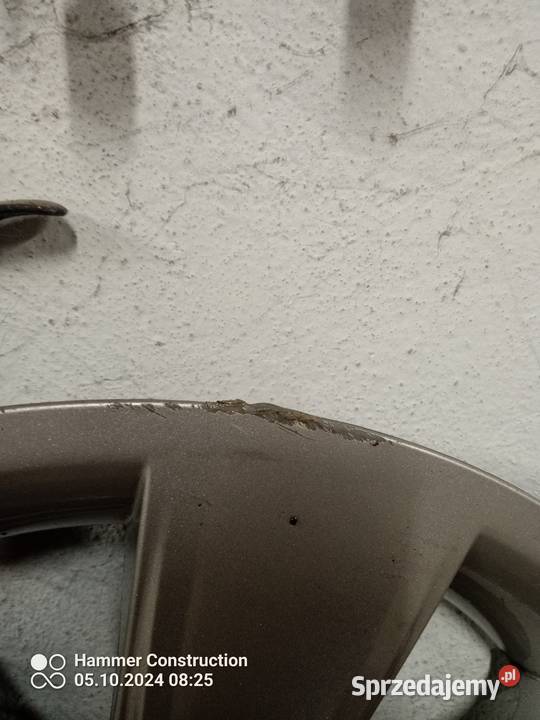 BMW seria E90 zimowe koła z kołpakami Włodzimierzów