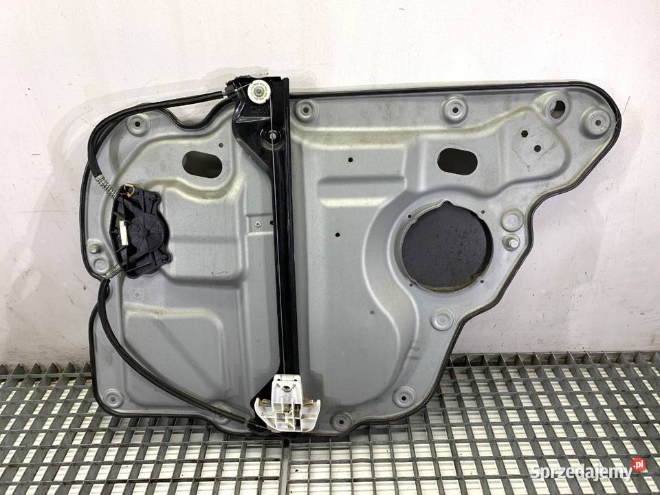 PODNOŚNIK SZYBY LEWY TYŁ VW TOURAN 1K0959703B Wyposażenie wnętrza