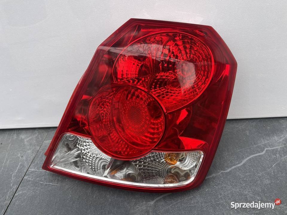 DAEWOO KALOS CHEVROLET AVEO PRAWA LAMPA TYŁ Lampy tylne Ostroróg