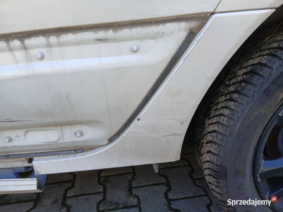 Renault Koleos 2010 nakładka progu lewy tył