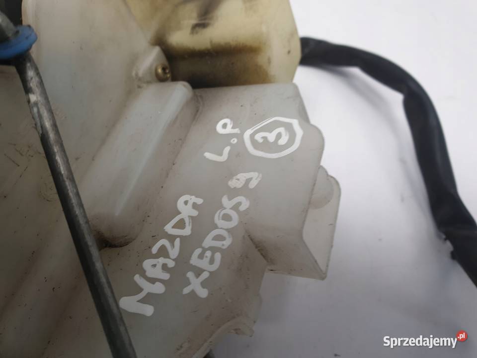 ZAMEK DRZWI LEWY PRZÓD Mazda Xedos 9 Przedni Chełm
