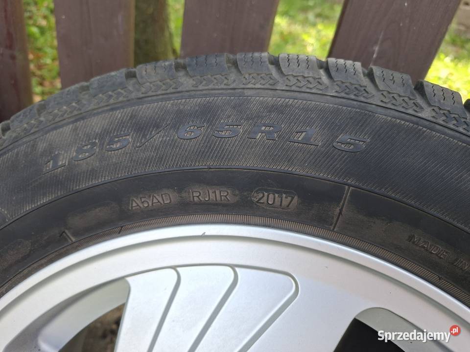 Koła zimowe felgi aluminiowe wiatraki Astra sprzedam