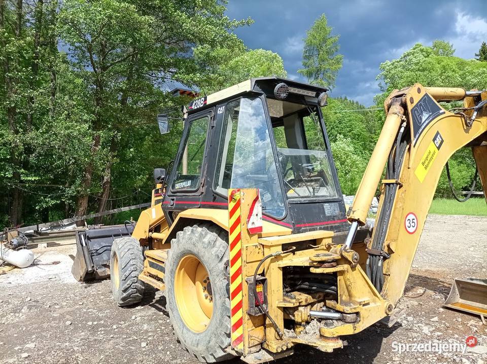 koparko ładowarka Cat 428b Sól