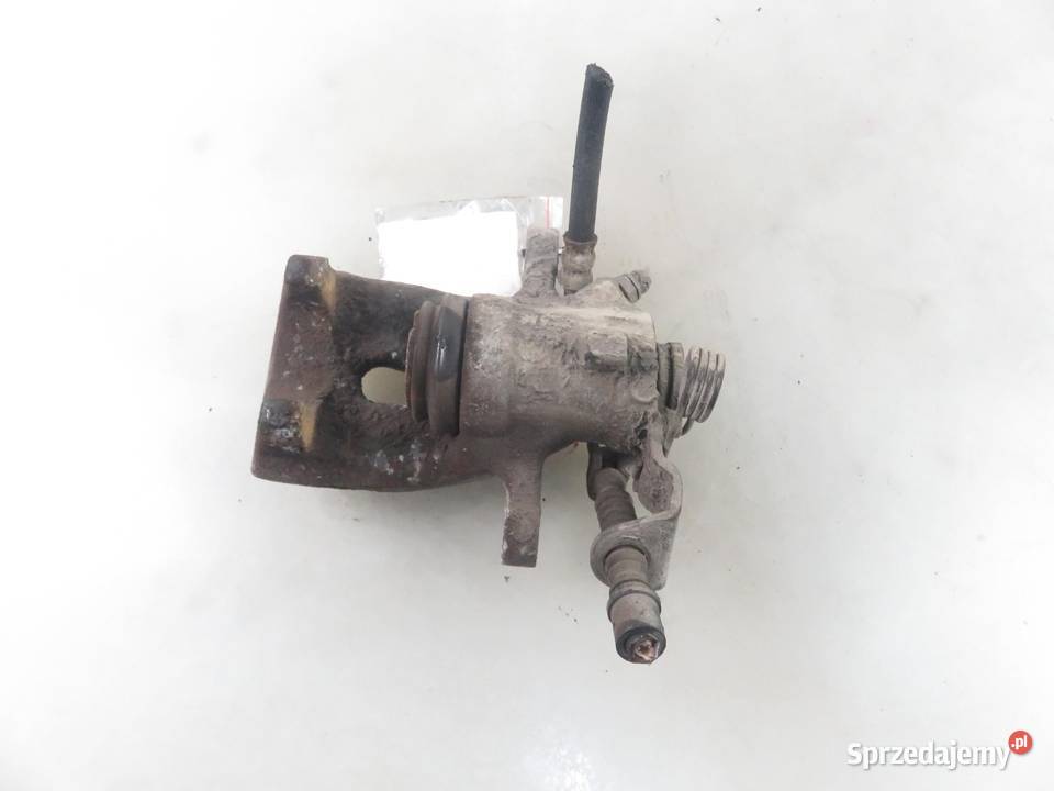 ZACISK PRAWY TYŁ OPEL ASTRA III H GTC