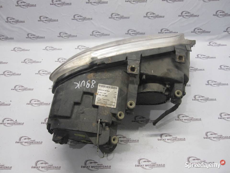 VOLKSWAGEN CADDY III 09r lampa lewy przód