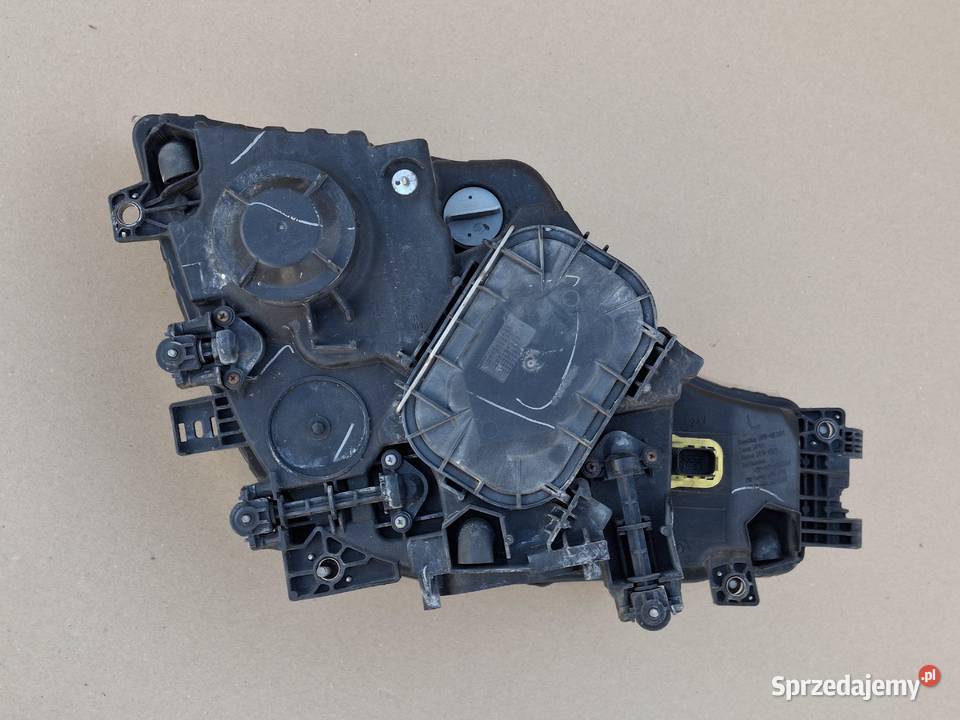 MECEDES ACTROS MP4 REFLEKTOR PRAWY ORYGINALNY Bieleń