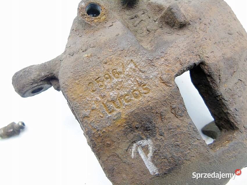 Zacisk hamulcowy przwy przód Nissan Almera Tino