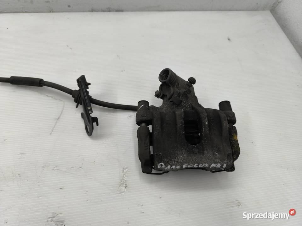 ZACISK LEWY TYŁ FORD FOCUS MK3 LIFT KOMBI Zaciski i jarzma sprzedam