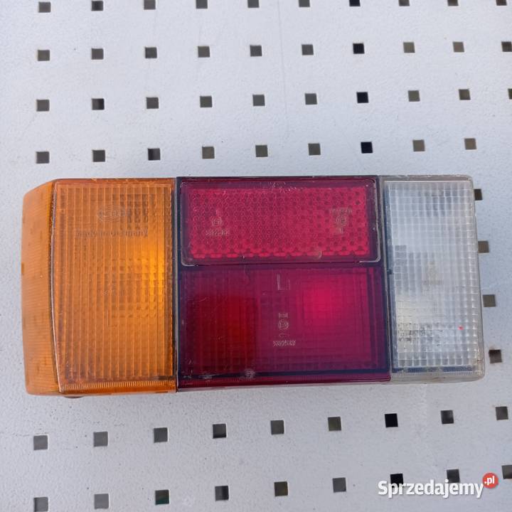 LAMPA LEWA VW GOLF I 77r 171945095 HELLA EUROPA Kamień Pomorski