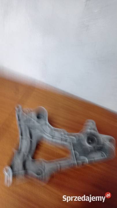 Wspornik koła mocowanie tłumika skuter SYM 250 Pozostałe Łubno