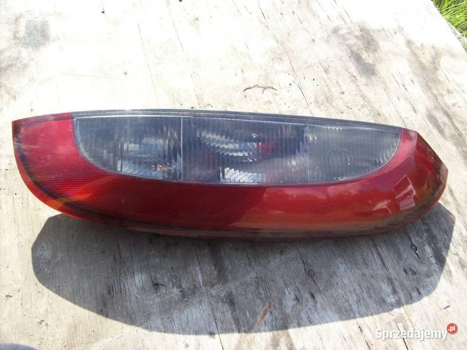 Corsa C Lampa tyl tylna prawa lewa Oryginal